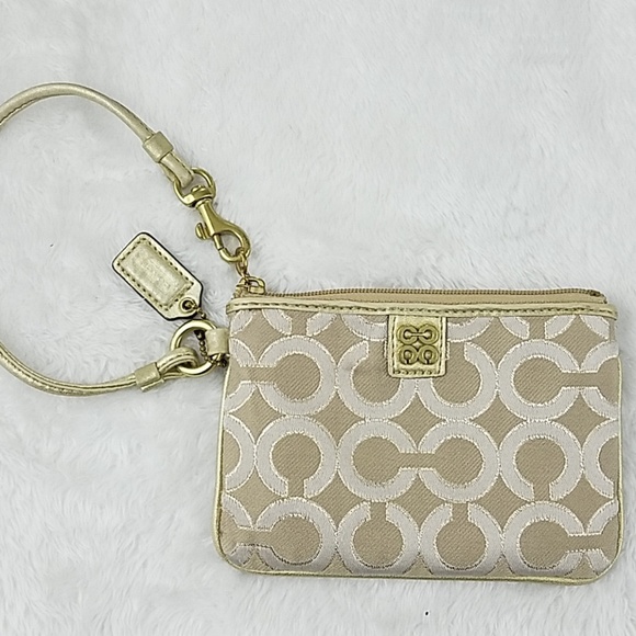 Coach Handbags - Coach gold wristlet